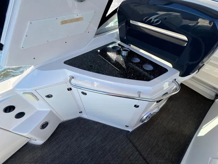  Yacht Photos Pics 2014 Monterey 320 Sport Yacht interior with sleek countertop and modern design.