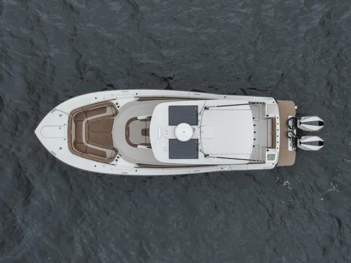 T/t Phoenix Yacht Photos Pics 2023 Scout 330 LXF boat, aerial view, on water.