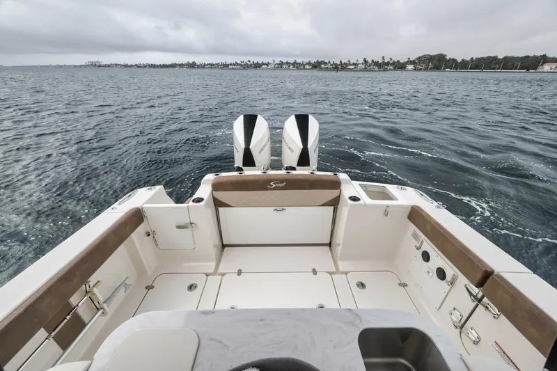 T/t Phoenix Yacht Photos Pics 2023 Scout 330 LXF boat on water, featuring dual engines and spacious deck.