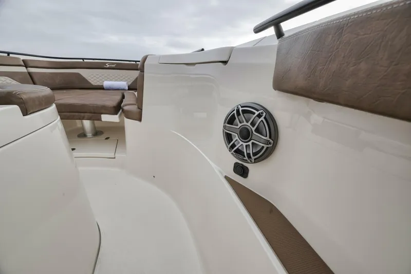 T/t Phoenix Yacht Photos Pics 2023 Scout 330 LXF boat interior with speaker and cushioned seating.