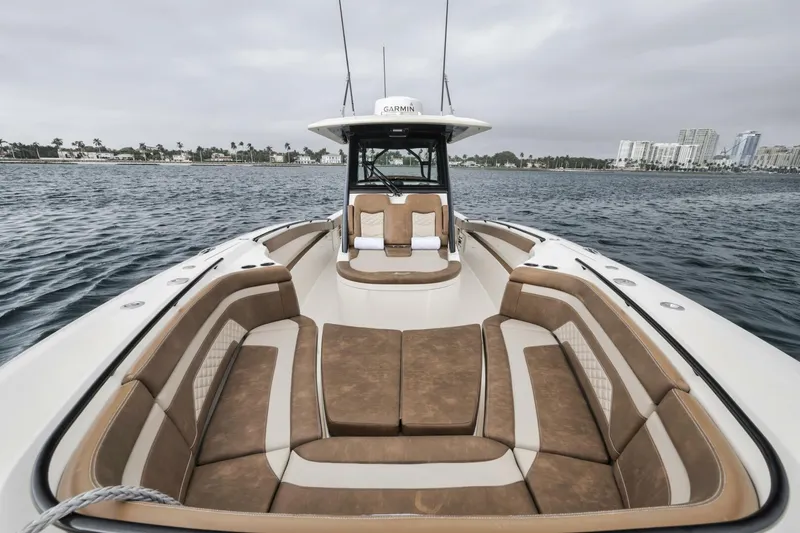 T/t Phoenix Yacht Photos Pics 2023 Scout 330 LXF boat with spacious seating on open water.