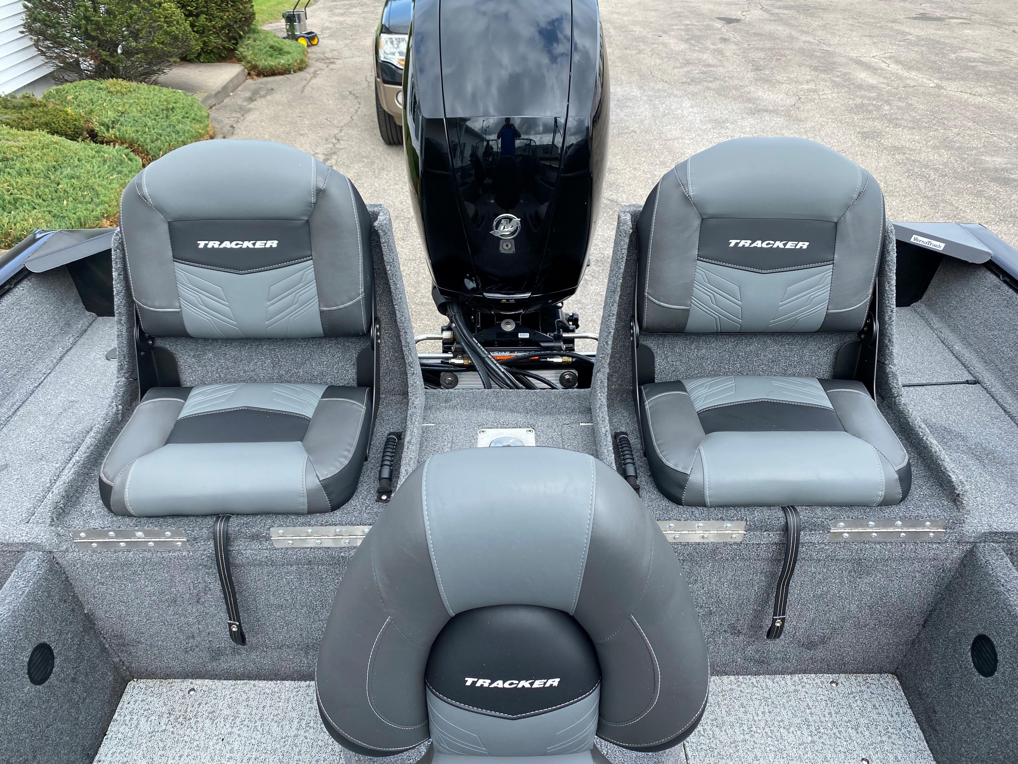 2020 Tracker Pro Guide V175 boat interior with three seats and outboard motor.