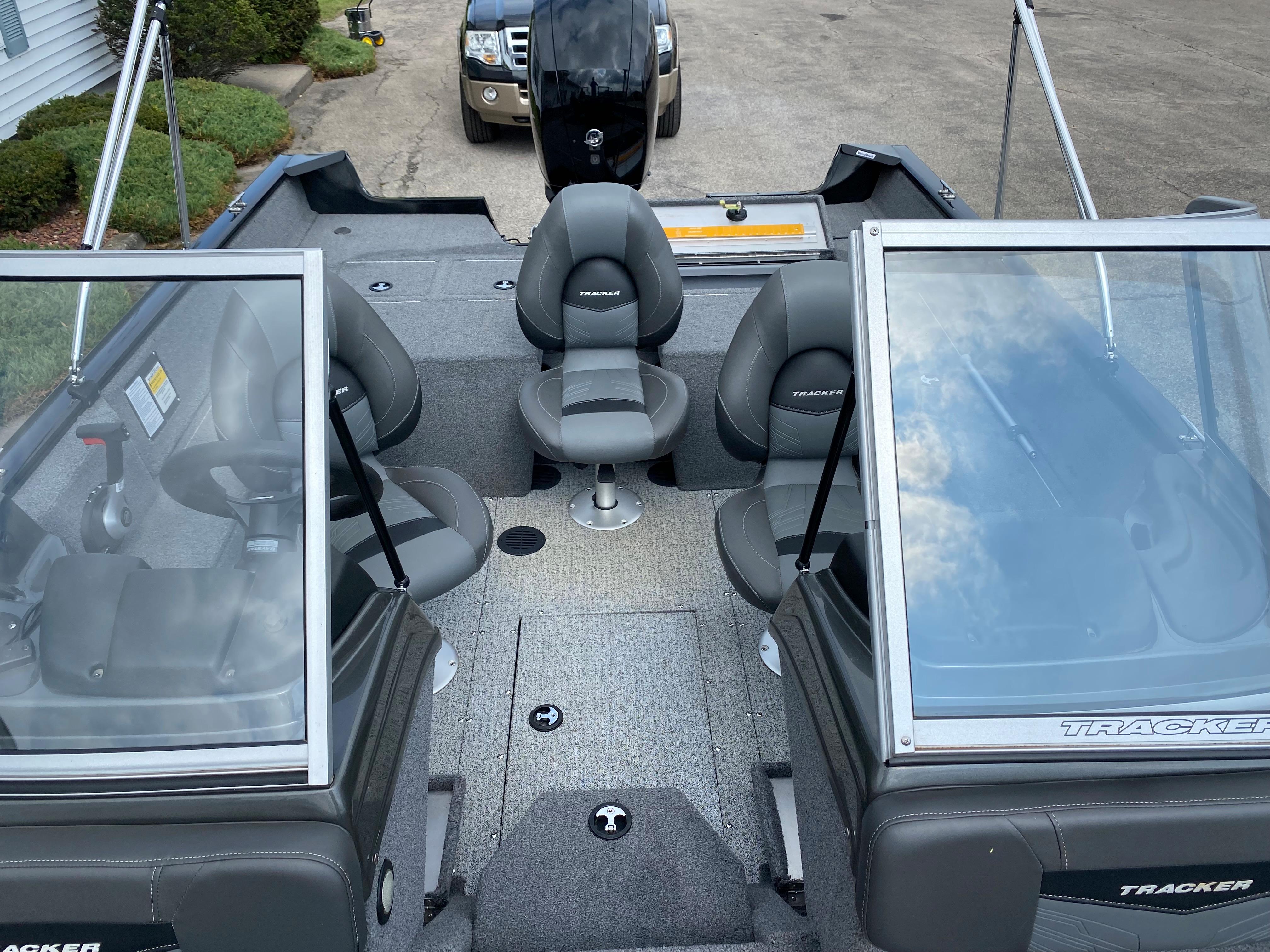 2020 Tracker Pro Guide V175 boat interior with seating and windshield.