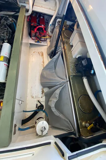 Saline Yacht Photos Pics Engine compartment of a 2005 MJM 34z Downeast boat, showing mechanical components and wiring.