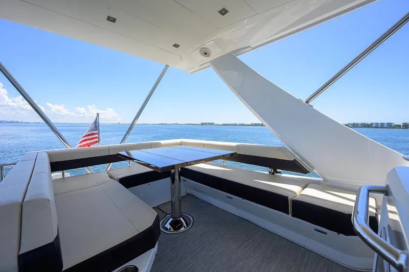 Unorthodocs Yacht Photos Pics Luxurious 2018 Cruisers 60 Cantius Fly yacht with elegant seating and ocean view.