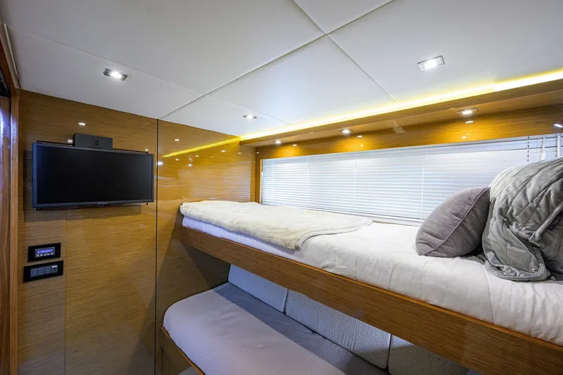 Unorthodocs Yacht Photos Pics Luxurious interior of 2018 Cruisers 60 Cantius Fly yacht with cozy bunk beds.