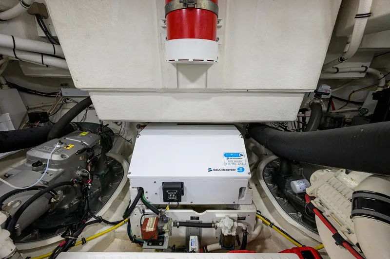 Unorthodocs Yacht Photos Pics Engine room of 2018 Cruisers 60 Cantius Fly with Seakeeper 9 stabilizer system.