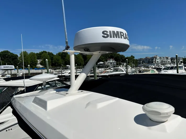  Yacht Photos Pics Sea Ray 320 DA 2021 boat with Simrad radar at marina.