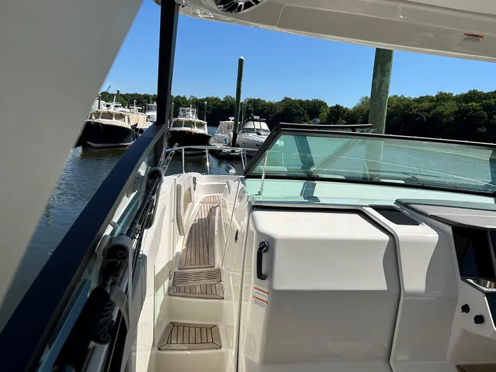  Yacht Photos Pics 2021 Sea Ray 320 DA boat docked at marina, view of deck and seating area.