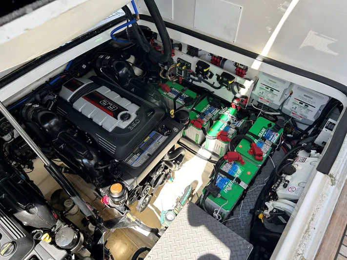  Yacht Photos Pics Engine compartment of a 2021 Sea Ray 320 DA boat with batteries and wiring.