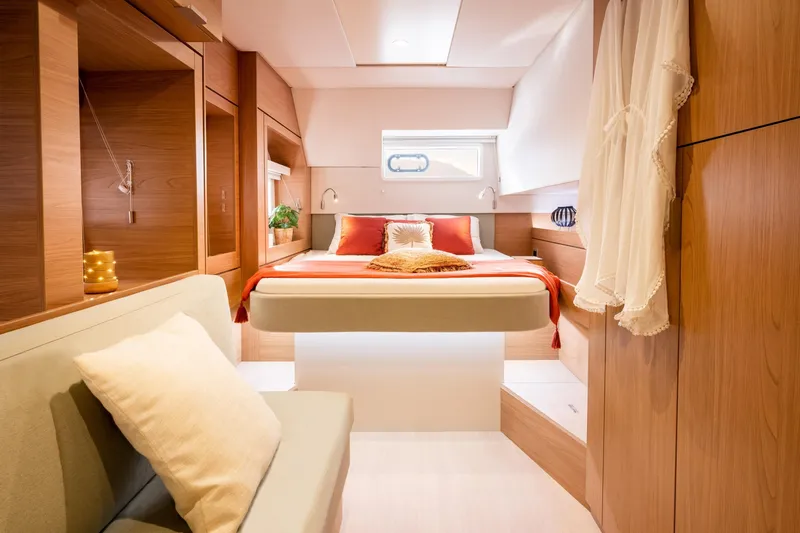 Azurea Yacht Photos Pics Luxurious Bali 4.6 yacht interior, 2026 model, featuring cozy bedroom with elegant wood finish.