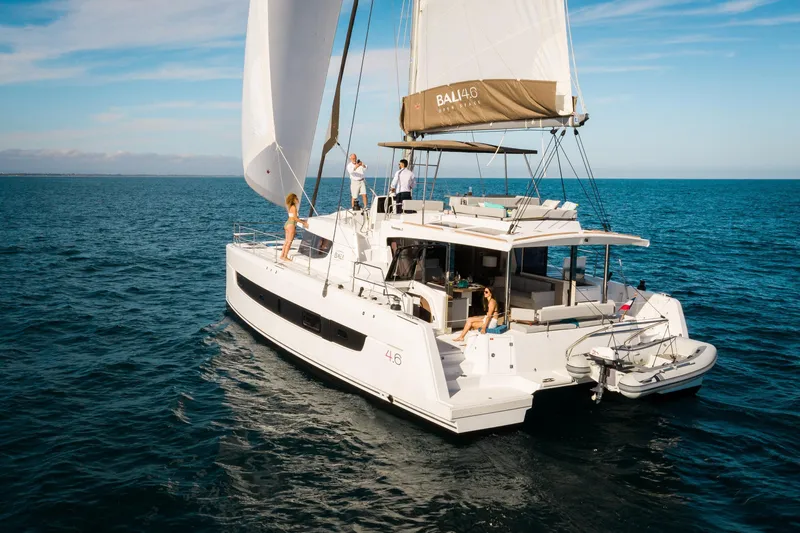 Azurea Yacht Photos Pics Sailing catamaran Bali 4.6, 2026 model, cruising on open sea with passengers onboard.