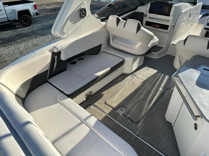 Yacht Photos Pics 2016 Chaparral 337SSX boat interior with seating and dashboard.