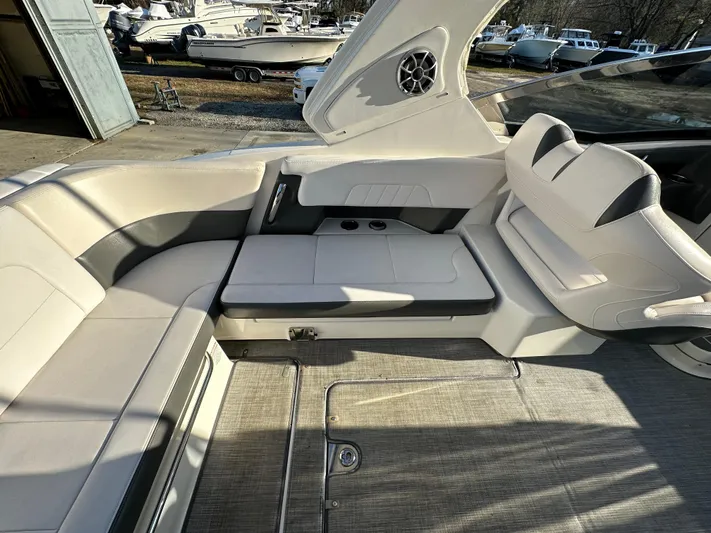  Yacht Photos Pics 2016 Chaparral 337SSX boat interior with beige seating and modern design.