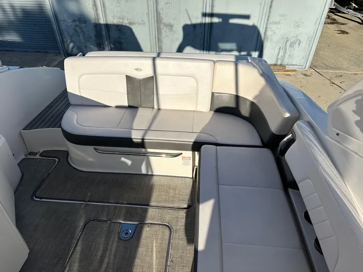  Yacht Photos Pics 2016 Chaparral 337SSX boat interior with white seating and gray flooring.