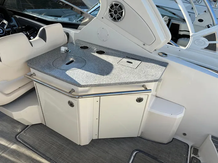  Yacht Photos Pics 2016 Chaparral 337SSX boat interior with sleek countertop and seating area.