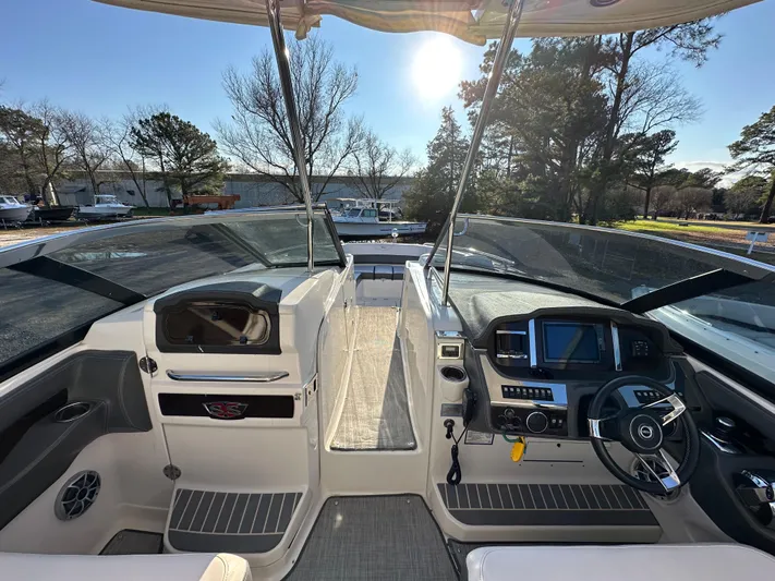  Yacht Photos Pics 2016 Chaparral 337SSX boat interior with modern dashboard and steering wheel.