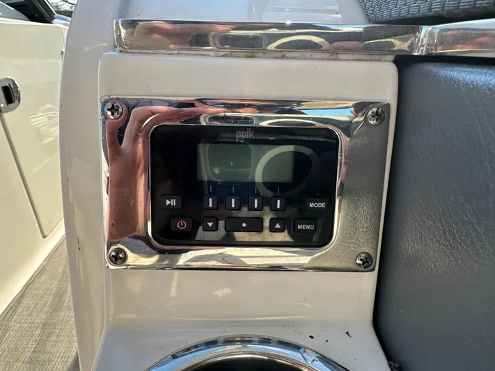  Yacht Photos Pics Polk audio control panel on 2016 Chaparral 337SSX boat dashboard.