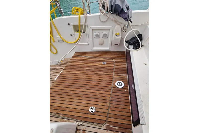 Eadan Doire Yacht Photos Pics 2017 Lagoon 42 yacht deck with teak flooring and nautical equipment.