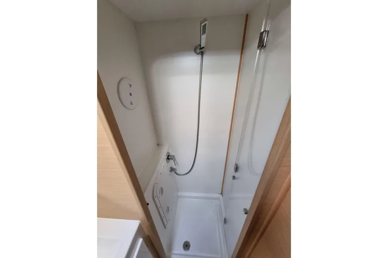 Eadan Doire Yacht Photos Pics Shower area in 2017 Lagoon 42 catamaran, featuring modern fixtures and compact design.