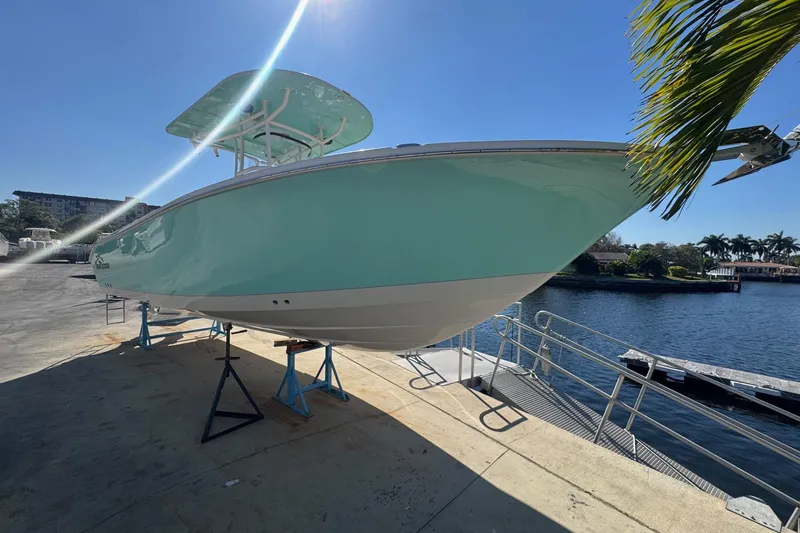  Yacht Photos Pics 2023 Sea Chaser 27 HFC CC boat on display by the waterfront.