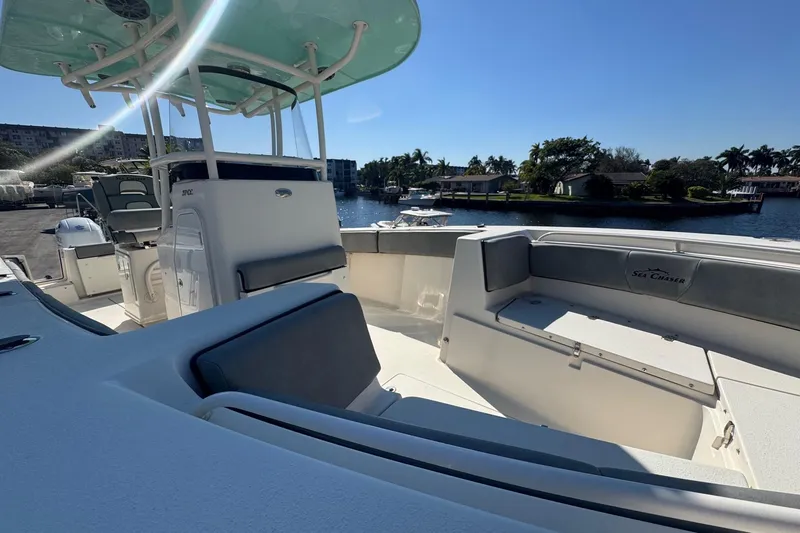 Yacht Photos Pics 2023 Sea Chaser 27 HFC CC boat interior with seating and water view.