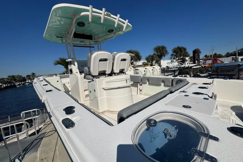  Yacht Photos Pics 2023 Sea Chaser 27 HFC CC boat with spacious deck and modern features.