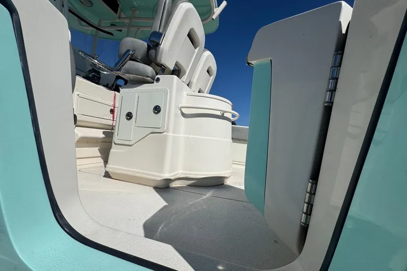  Yacht Photos Pics 2023 Sea Chaser 27 HFC CC boat interior with seating and storage compartments.