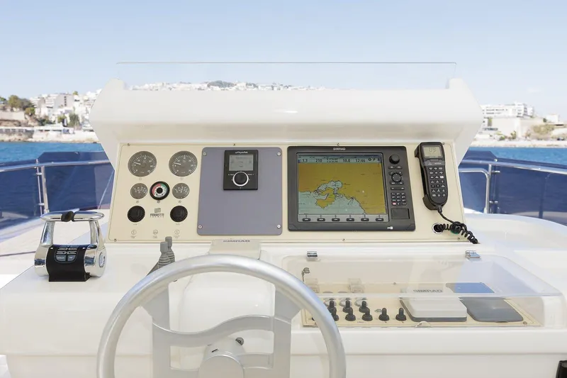 M/y Em-es II Yacht Photos Pics Cockpit of 2013 Ferretti Yachts 750 HT with navigation equipment and controls.