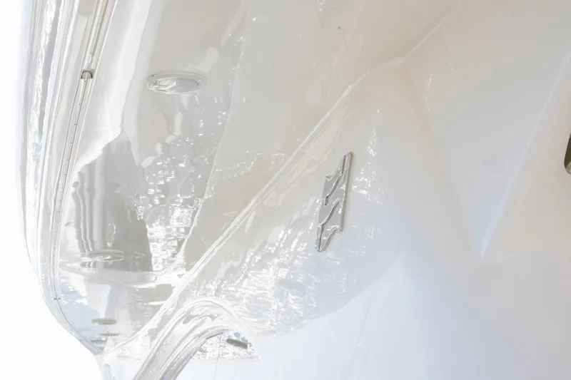 M/y Em-es II Yacht Photos Pics Close-up of 2013 Ferretti Yachts 750 HT hull with sleek, glossy finish.