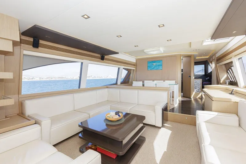 M/y Em-es II Yacht Photos Pics Luxurious interior of 2013 Ferretti Yachts 750 HT with elegant white seating and ocean view.