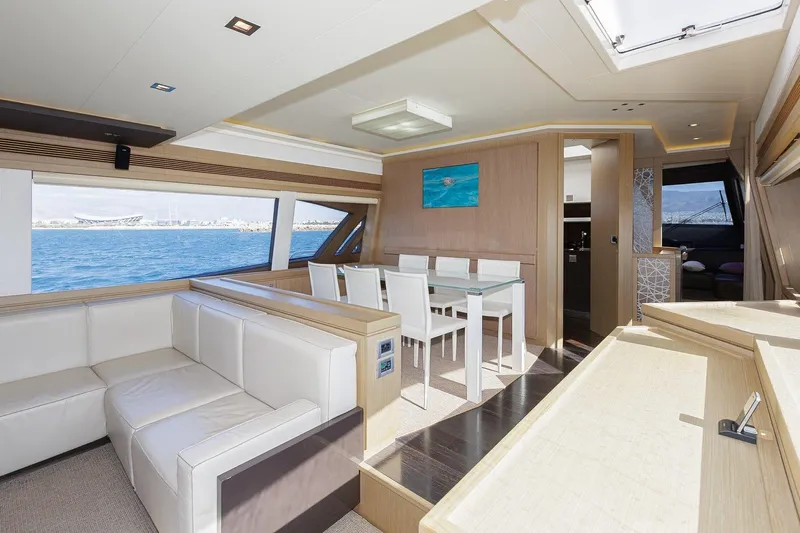 M/y Em-es II Yacht Photos Pics Luxurious interior of 2013 Ferretti Yachts 750 HT with elegant seating and dining area.