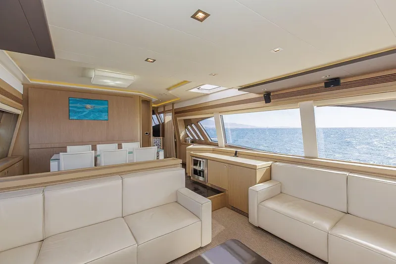 M/y Em-es II Yacht Photos Pics Luxurious interior of 2013 Ferretti Yachts 750 HT with ocean view and elegant seating.