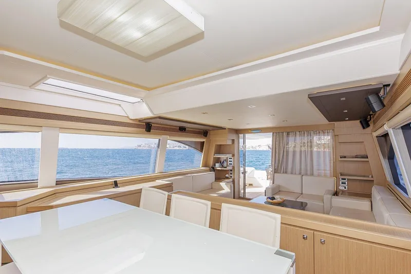 M/y Em-es II Yacht Photos Pics Luxurious interior of 2013 Ferretti Yachts 750 HT with ocean view through large windows.