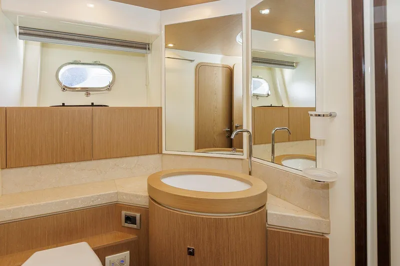 M/y Em-es II Yacht Photos Pics Luxurious bathroom interior of 2013 Ferretti Yachts 750 HT with modern fixtures.