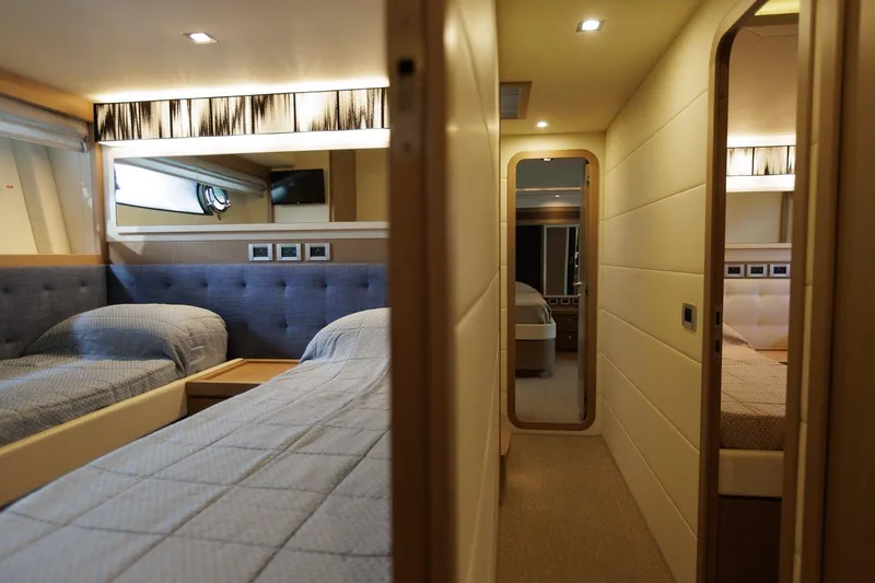 M/y Em-es II Yacht Photos Pics Luxurious interior of 2013 Ferretti Yachts 750 HT with twin beds and modern decor.