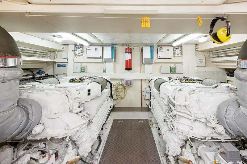 M/y Em-es II Yacht Photos Pics Engine room of 2013 Ferretti Yachts 750 HT, featuring dual engines and safety equipment.