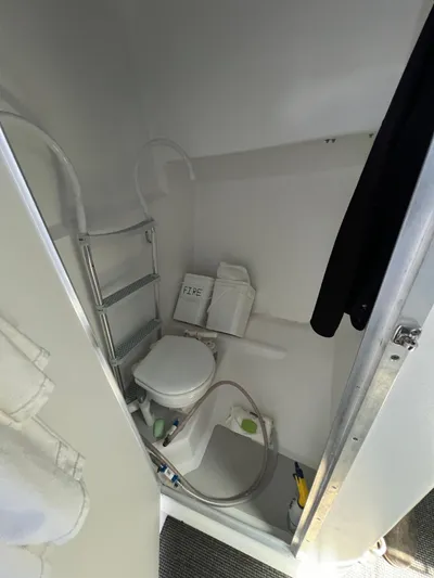 Lady Grace Yacht Photos Pics Compact bathroom in 2022 Wesmac 38 boat with toilet and shower.