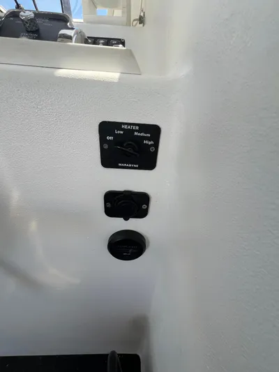 Lady Grace Yacht Photos Pics Control panel on a 2022 Wesmac 38 boat, featuring heater settings.