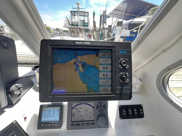 Lady Grace Yacht Photos Pics Navigation system on 2022 Wesmac 38 boat, displaying nautical map and controls.