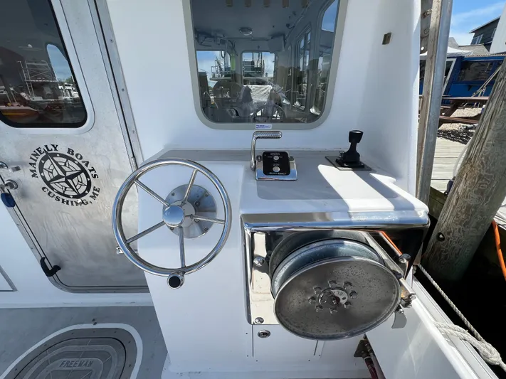 Lady Grace Yacht Photos Pics Wesmac 38 boat helm with steering wheel and controls, 2022 model.