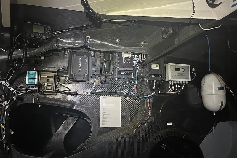 Prysmian Yacht Photos Pics Interior of a 2015 Multiplast Imoca 60 yacht showing electronic equipment and wiring.