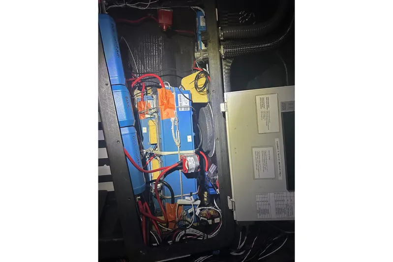 Prysmian Yacht Photos Pics Electrical system inside a 2015 Multiplast Imoca 60 yacht, featuring wiring and components.