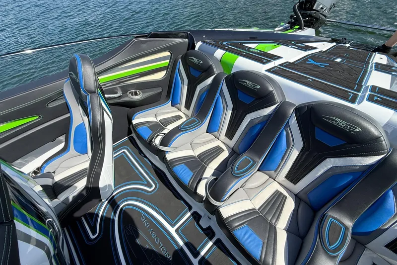  Yacht Photos Pics Luxury seating on 2022 MTI 390X boat with blue and green accents.