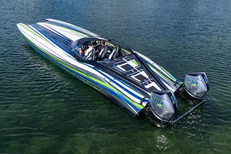  Yacht Photos Pics 2022 MTI 390X powerboat with dual engines on clear water.