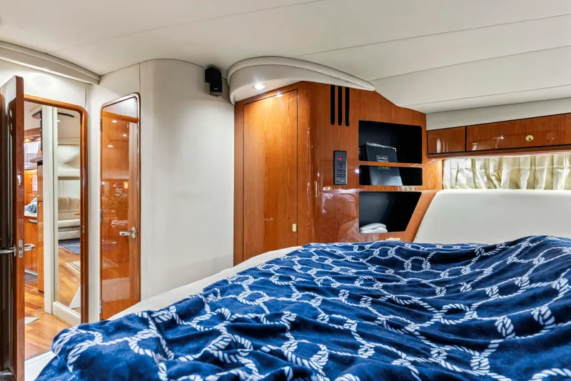 My Addiction Yacht Photos Pics Luxurious interior of 2001 Sea Ray Sundancer 510 yacht with elegant wood finishes.