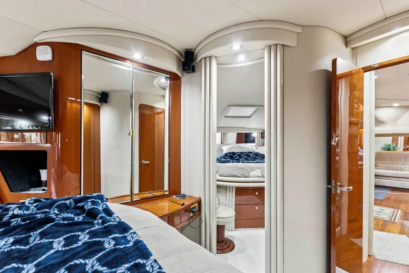 My Addiction Yacht Photos Pics Luxurious interior of 2001 Sea Ray Sundancer 510 yacht with elegant wood finishes.