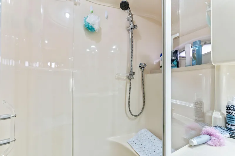 My Addiction Yacht Photos Pics Shower area in 2001 Sea Ray Sundancer 510 yacht, featuring modern fixtures and toiletries.