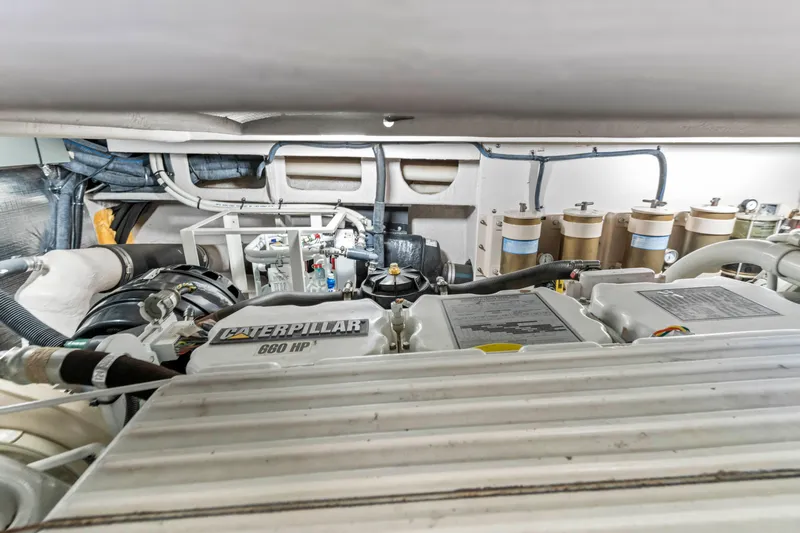 My Addiction Yacht Photos Pics Engine room of 2001 Sea Ray Sundancer 510 with Caterpillar 660 HP engine.