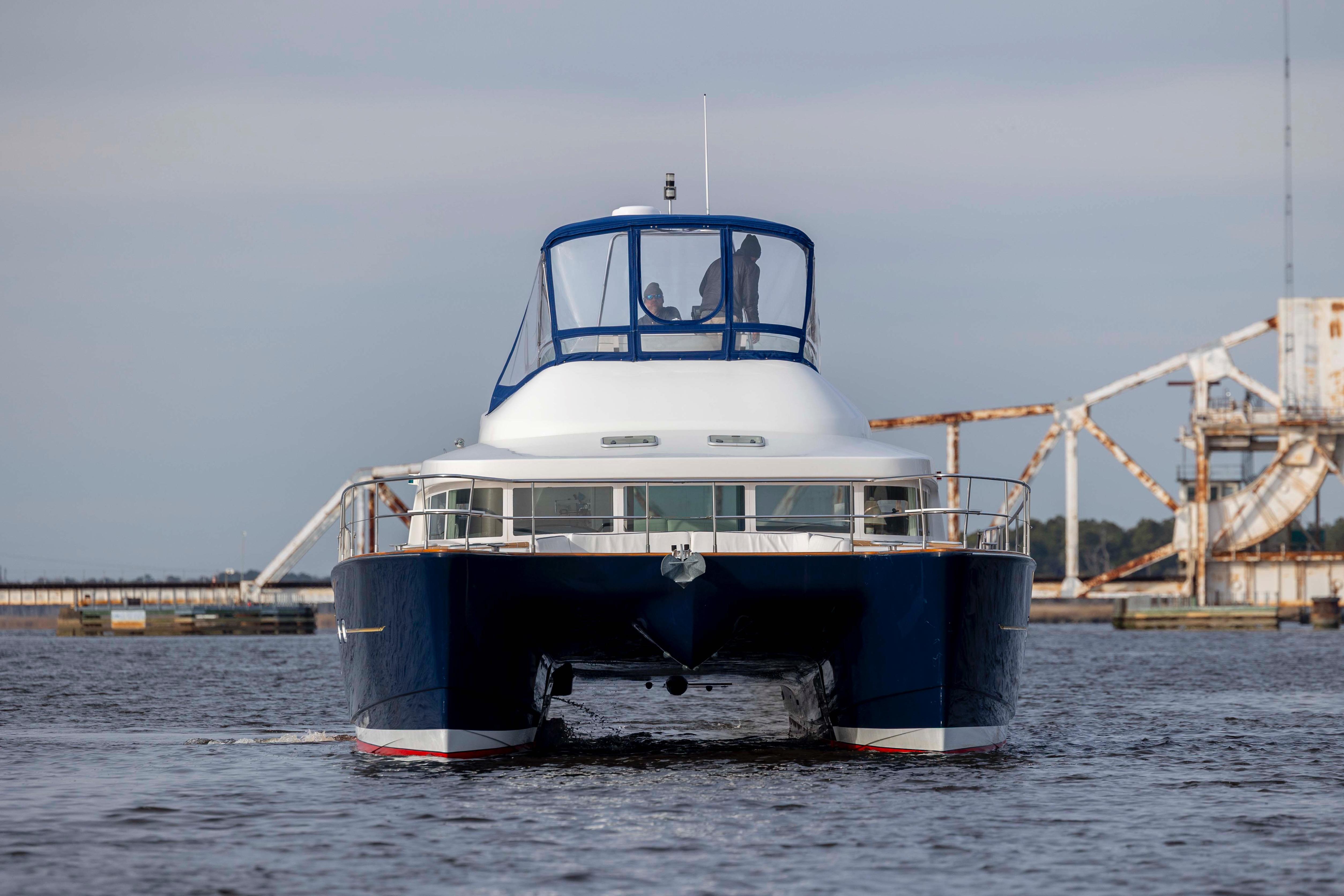 Front view of a 2004 Lagoon 43 PC yacht on the water.